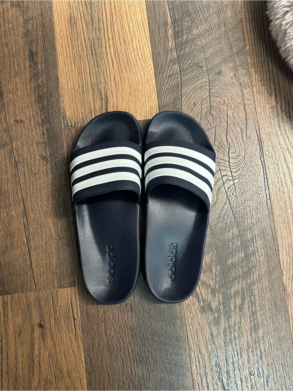 adidas women’s Navy Slide Sandals with White Stripes